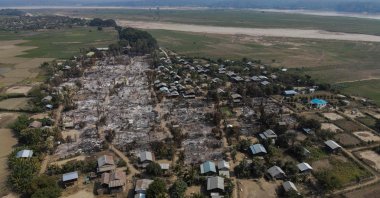 This handout photo by Chin Twin Chit Thu taken on Feb. 3, 2022 and released on Feb. 5, 2022 shows an aerial photo of burnt buildings from fires in Mingin Township, in Sagaing Division, where more than 105 buildings were destroyed by junta military troops, according to local media. (AFP File Photo)