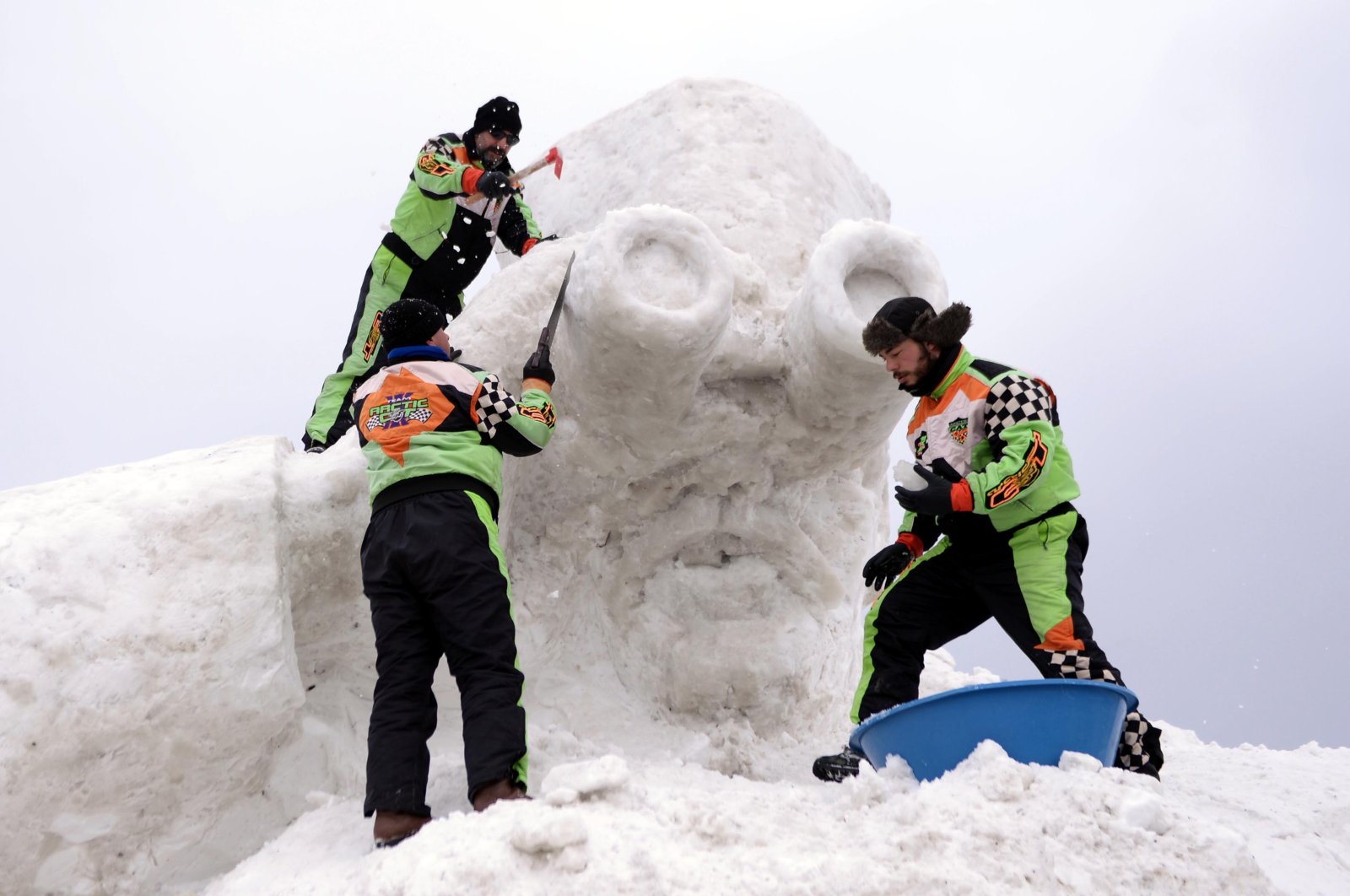 Teams construct a snow sculpture of Atatürk in Ardahan, eastern Turkey, Feb. 10, 2022. (AA photo)