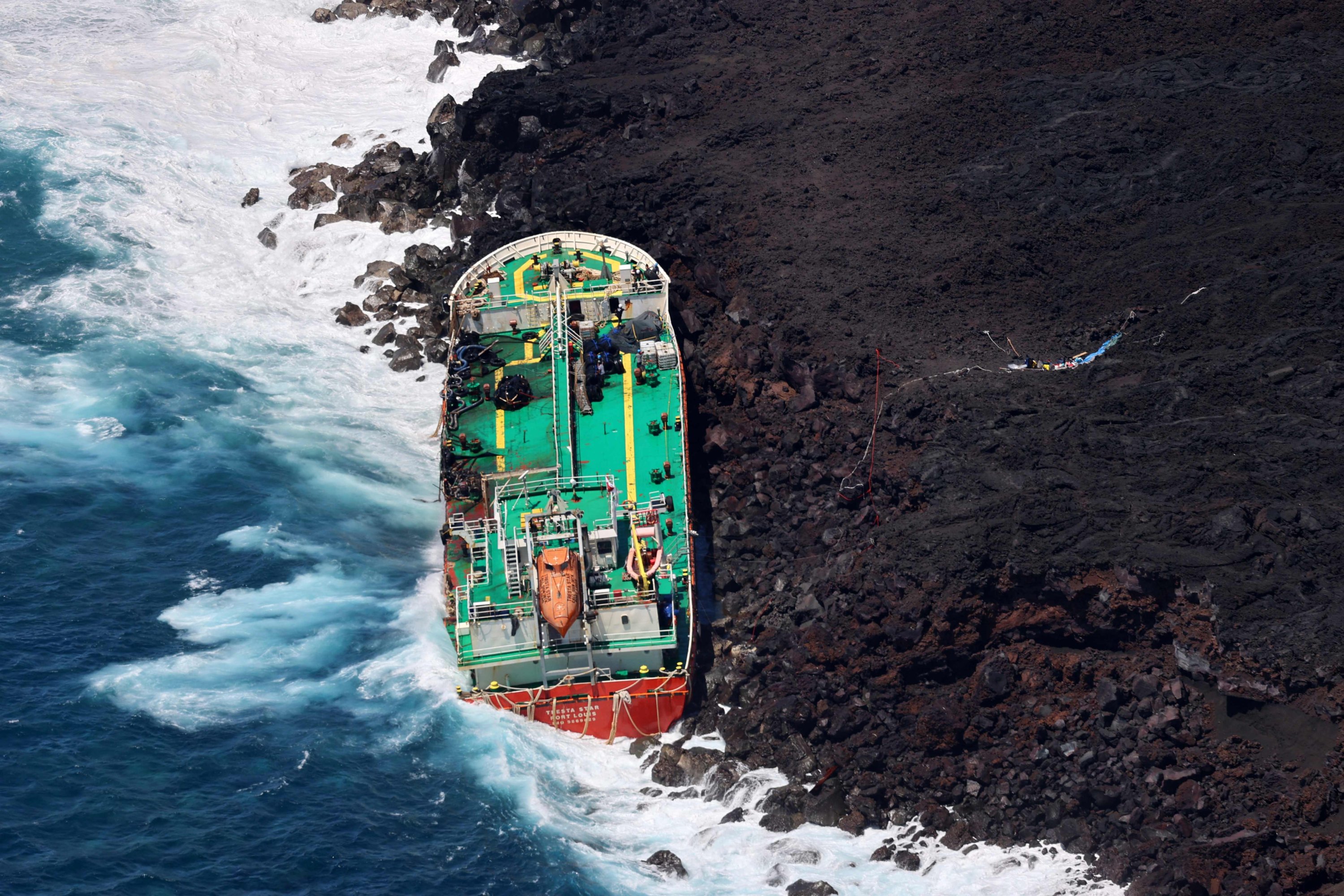 An aerial view shows the Mauritian oil tanker Tresta Star, stranded off the coast of Reunion Island, at Le Tremblet, near Saint-Philippe, after the Batsirai cyclone hit Madagascar and the area, Feb. 11, 2022. (AFP Photo)