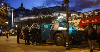 Armored vehicles are parked by the Grand Palais, near the Champs Elysee, as French police expect people to gather for the &quot;Freedom Convoy&quot; in Paris, France, Feb. 11, 2022. (EPA Photo)