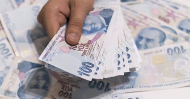 Citing financial stability concerns, Fitch Ratings has lowered Turkey's credit rating. (Sabah Photo)