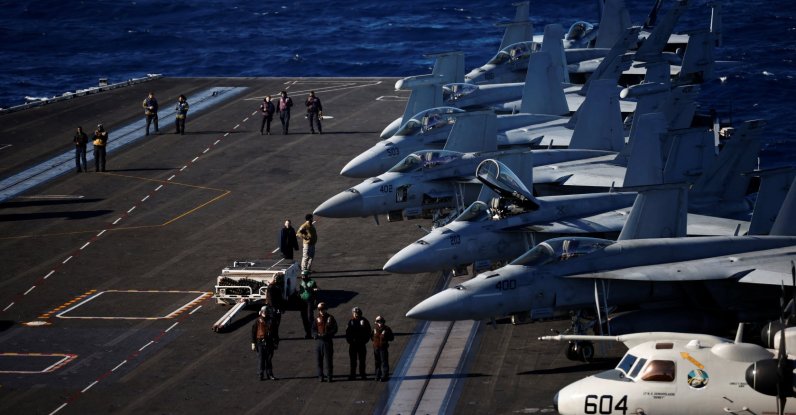 U.S. Navy sailors operate onboard aircraft carrier USS Harry S. Truman, in the Adriatic Sea, Feb. 2, 2022. (Reuters Photo)