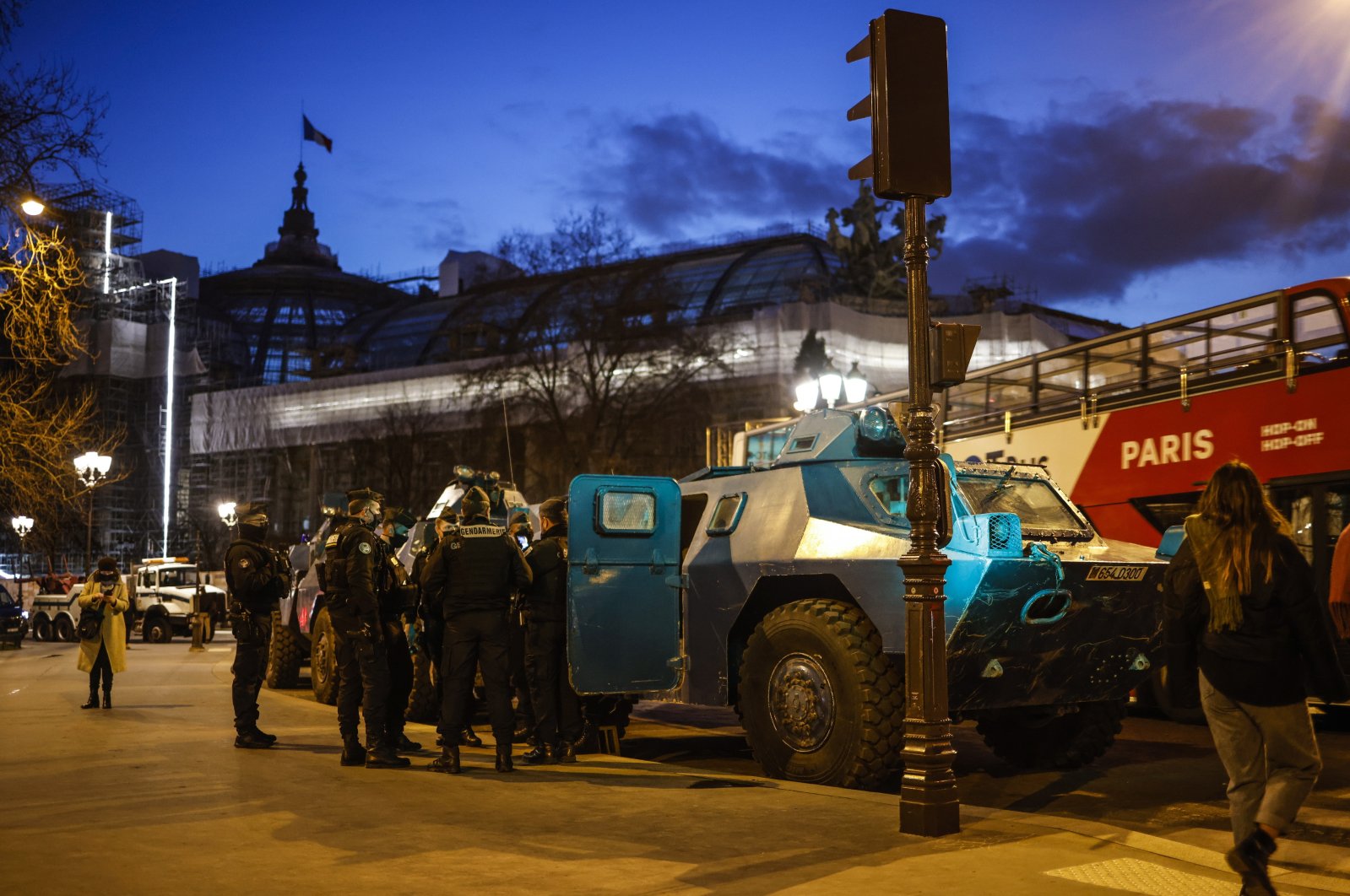 Armored vehicles are parked by the Grand Palais, near the Champs Elysee, as French police expect people to gather for the &quot;Freedom Convoy&quot; in Paris, France, Feb. 11, 2022. (EPA Photo)