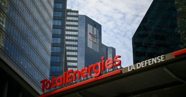 The new TotalEnergies logo during its unveiling ceremony, at a charging station in La Defense on the outskirts of Paris, France, May 28, 2021. (AFP Photo)