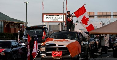 A convoy of truckers and supporters continue to protest COVID-19 vaccine mandates near the border in Surrey, British Columbia, Canada, Feb. 12, 2022. (Reuters Photo)