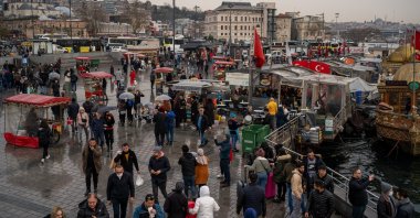 People walk in the Eminönü neighborhood, in Istanbul, Turkey, Dec. 29, 2021. (Reuters Photo)