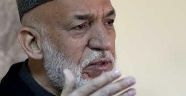 Afghanistan's former President Hamid Karzai, speaks during a press conference, in Kabul, Afghanistan, Feb. 13, 2022. (AP Photo)