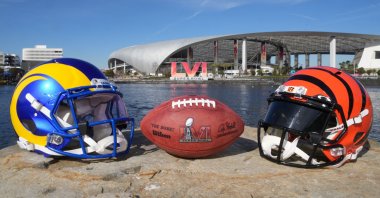 Los Angeles Rams and Cincinnati Bengals helmets are seen with a Wilson NFL official Duke football and the SBLVI numerals at SoFi Stadium, Inglewood, CA, U.S., Feb 8, 2022. (Reuters Photo)