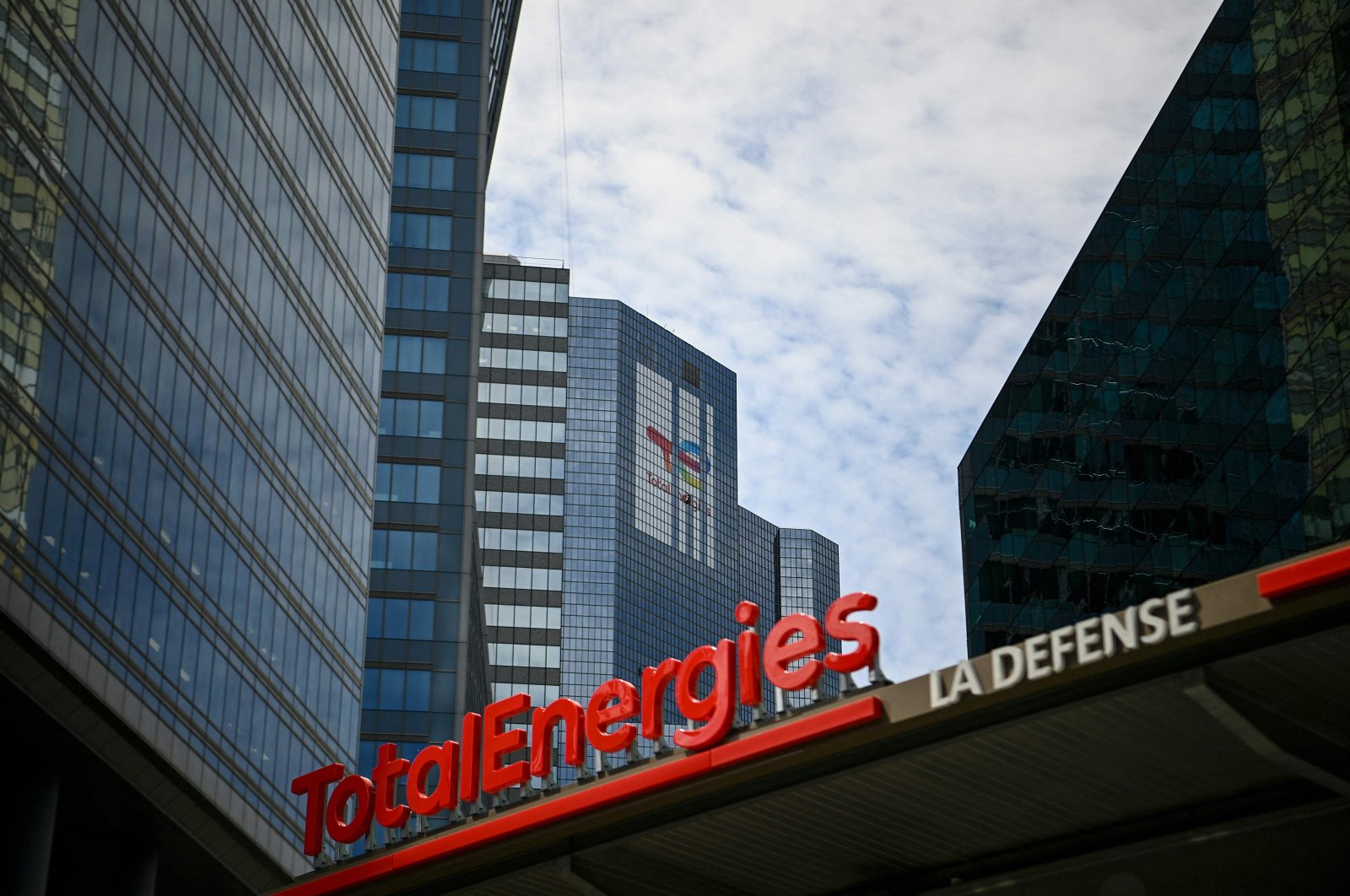 The new TotalEnergies logo during its unveiling ceremony, at a charging station in La Defense on the outskirts of Paris, France, May 28, 2021. (AFP Photo)