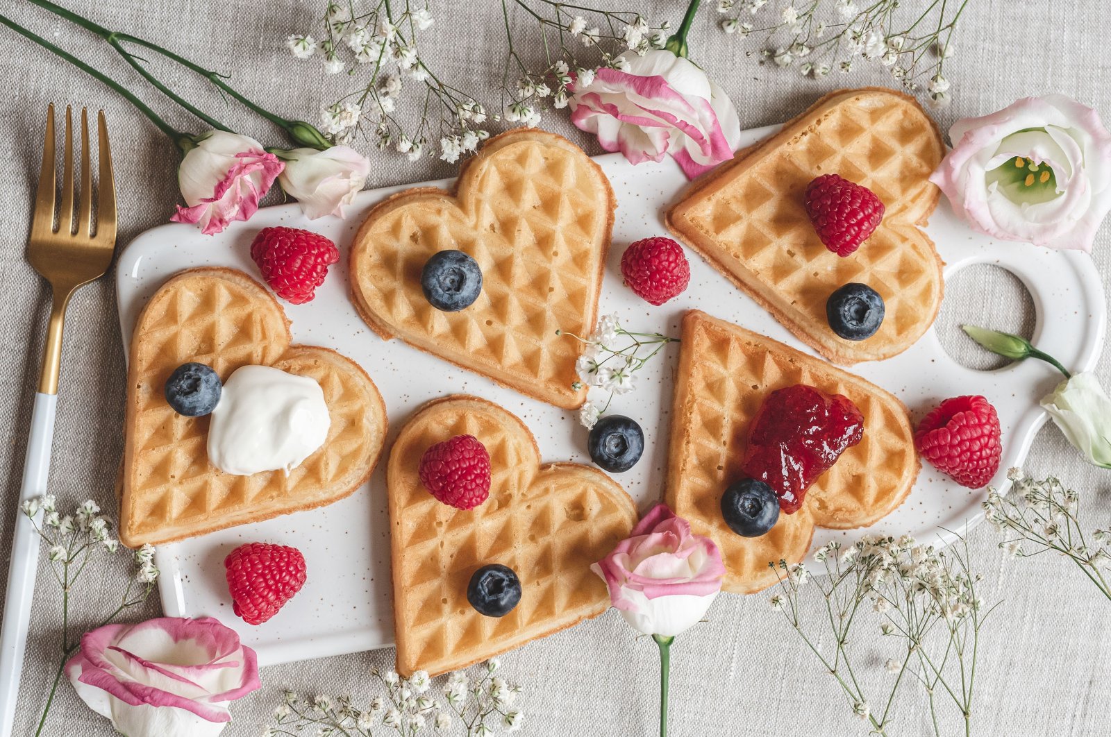 Homemade waffles in the shape of hearts. (Shutterstock Photo)