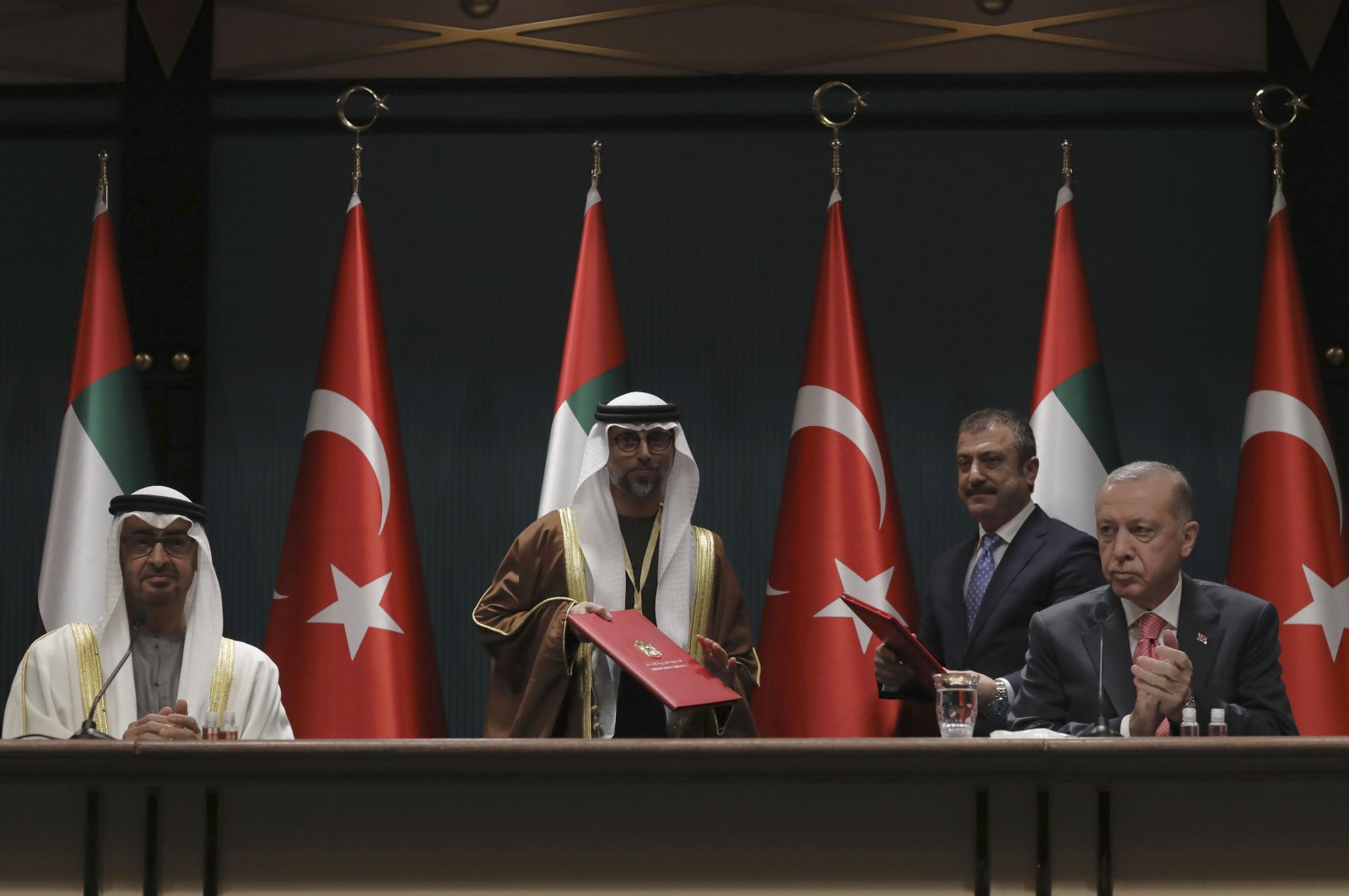 President Recep Tayyip Erdoğan (R) and Abu Dhabi Crown Prince Sheikh Mohammed bin Zayed Al Nahyan (L) attend a signing ceremony at the Presidential Complex in the capital Ankara, Turkey, Nov. 24, 2021. (AP Photo)