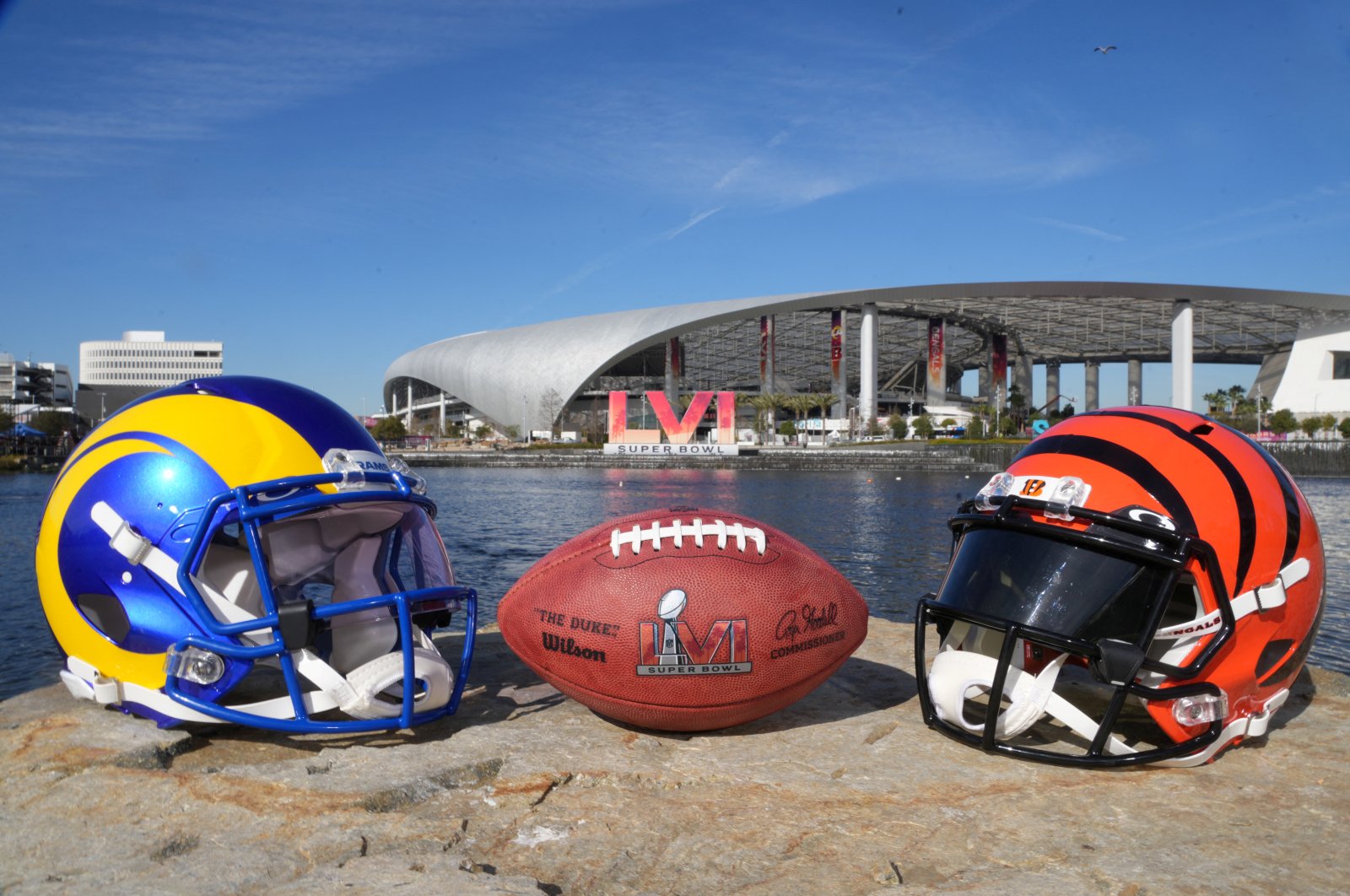Los Angeles Rams and Cincinnati Bengals helmets are seen with a Wilson NFL official Duke football and the SBLVI numerals at SoFi Stadium, Inglewood, CA, U.S., Feb 8, 2022. (Reuters Photo)