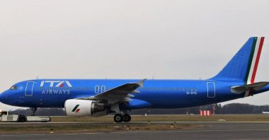 A new state-owned Italian carrier Italia Trasporto Aereo (ITA Airways) plane with the new blue livery dedicated to the Italian football player Paolo Rossi, is seen at Fiumicino airport, in Rome, Italy, Dec. 24, 2021. (Reuters Photo)