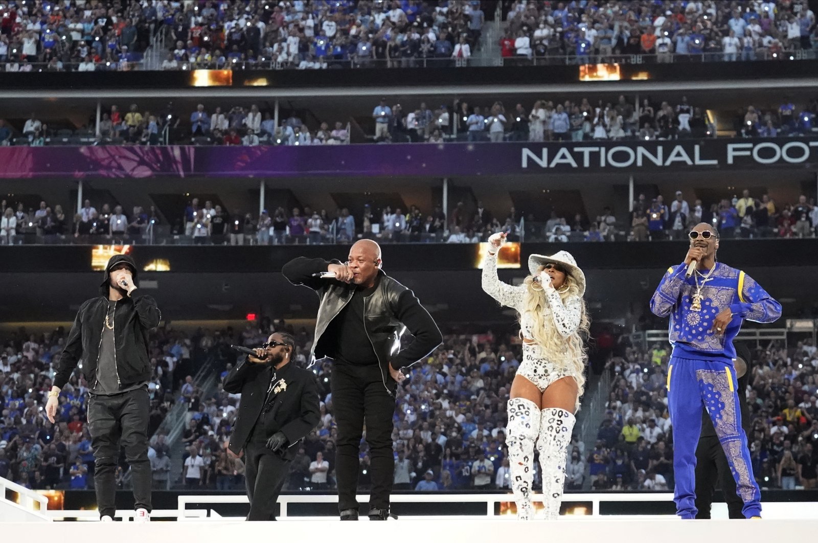 Eminem (from L) performs with Kendrick Lamar, Dr. Dre, Mary J. Blige and Snoop Dogg during halftime of the NFL Super Bowl 56 football game between the Los Angeles Rams and the Cincinnati Bengals, Feb. 13, 2022, Inglewood, California, U.S. (AP Photo)