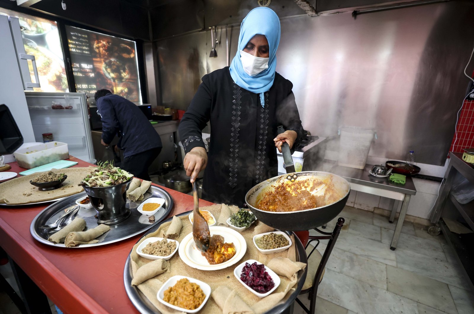 Khadija Ali is seen at her Ethiopian restaurant, Blue Nile, in the capital Ankara, Turkey, Feb. 10, 2022. (AA PHOTO) 