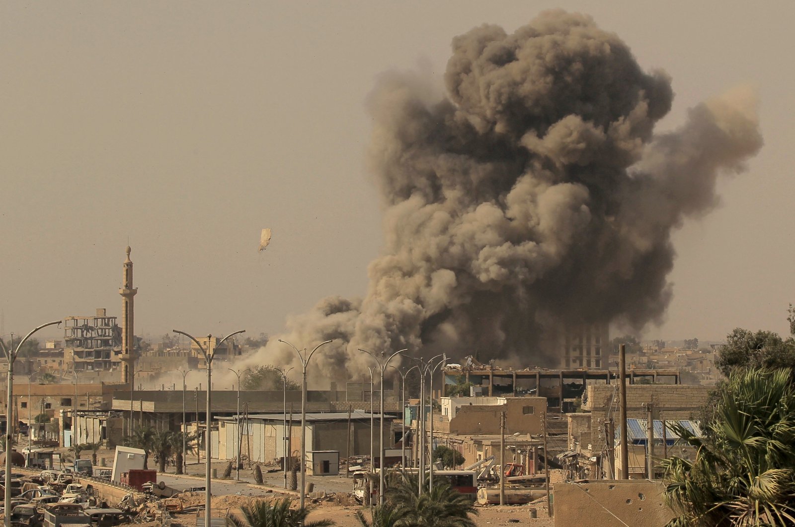 Smoke rises after an airstrike during fighting between members of the YPG and Daesh terrorist groups in Raqqa, Syria, Aug. 15, 2017. (Reuters Photo)