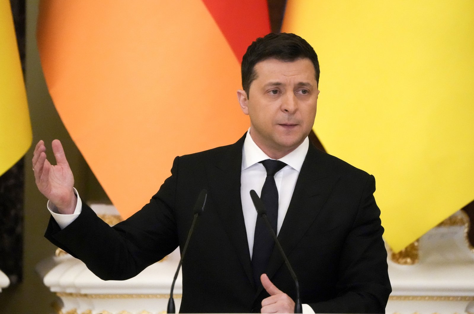 Ukrainian President Volodymyr Zelenskyy gestures during joint news conference with German Chancellor Olaf Scholz following the talks at The Mariinskyi Palace in Kyiv, Ukraine, Feb. 14, 2022. (AP Photo)