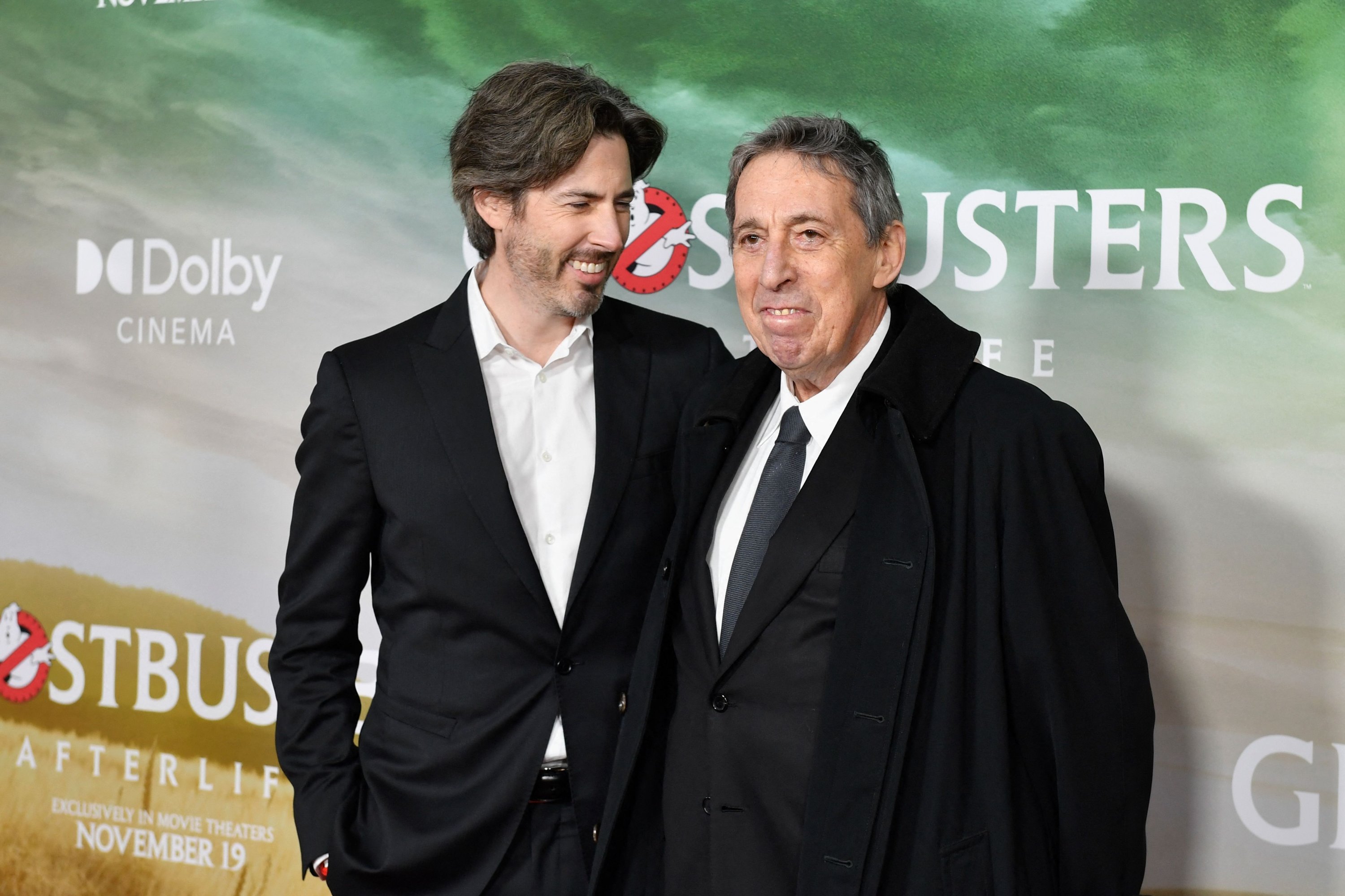 In this file photo taken on Nov. 15, 2021, Canadian American actor and filmmaker Jason Reitman (L) and Canadian filmmaker Ivan Reitman attend the 