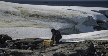 Capt. Ilyas Akpınar sets up equipment on Dismal Island, Antarctica, Feb. 14, 2022. (AA PHOTO)