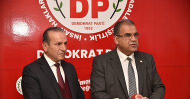 Prime Minister of the Turkish Republic of Northern Cyprus (TRNC) Faiz Sucuoğlu (R) and Democratic Party Chairperson Fikri Ataoğlu come together in Nicosia (Lefkoşa), TRNC, Feb. 9, 2022. (AA Photo)