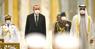 President Recep Tayyip Erdoğan and Abu Dhabi Crown Prince Sheikh Mohammed bin Zayed Al Nahyan stand for an honor guard at the Qasr Al Watan palace in Abu Dhabi, United Arab Emirates, Feb. 14, 2022. (AP Photo)