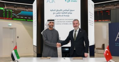 Borsa Istanbul General Manager Korkmaz Ergün (R) Abu Dhabi Securities Exchange General Manager and CEO Saeed al-Dhaheri during the signing ceremony of the agreement, Abu Dhabi, UAE, Feb. 15, 2022. (AA Photo)
