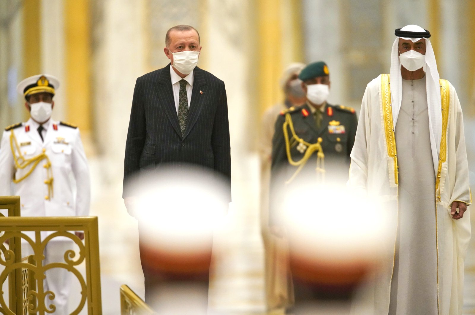 President Recep Tayyip Erdoğan and Abu Dhabi Crown Prince Sheikh Mohammed bin Zayed Al Nahyan stand for an honor guard at the Qasr Al Watan palace in Abu Dhabi, United Arab Emirates, Feb. 14, 2022. (AP Photo)