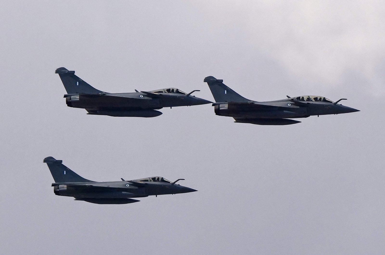 Three Rafale jet fighters flying over the city of Athens, Greece, Jan. 19, 2022. (AFP Photo)