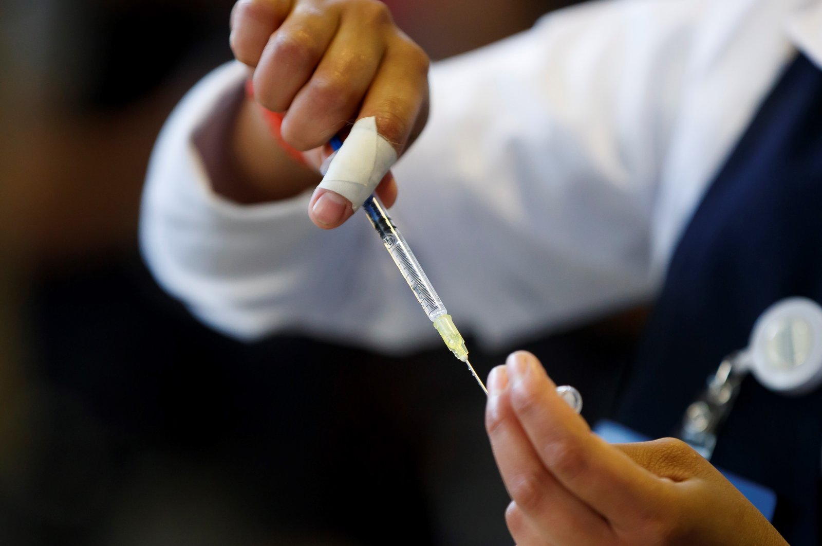 Health personnel prepares doses against COVID-19 in a vaccination center that includes, among others, the Russian Sputnik V vaccine, in Mexico City, Mexico, Feb. 14, 2022. (EPA Photo)