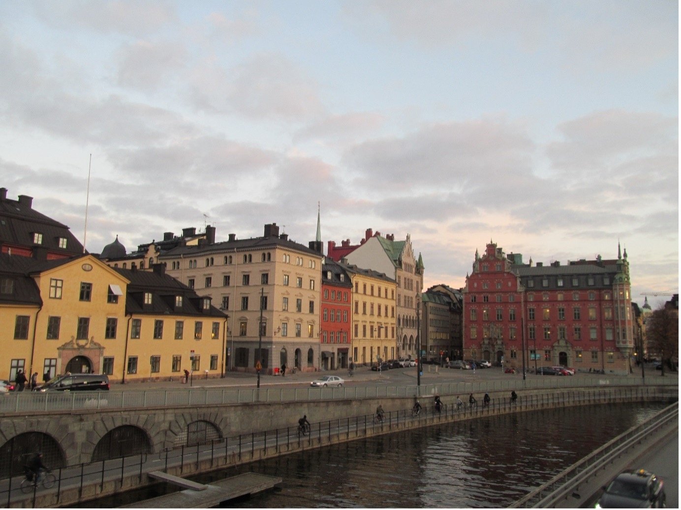 The colorful and ancient buildings of Stockholm are surrounded by a calm river. (Photo courtesy of Karin)
