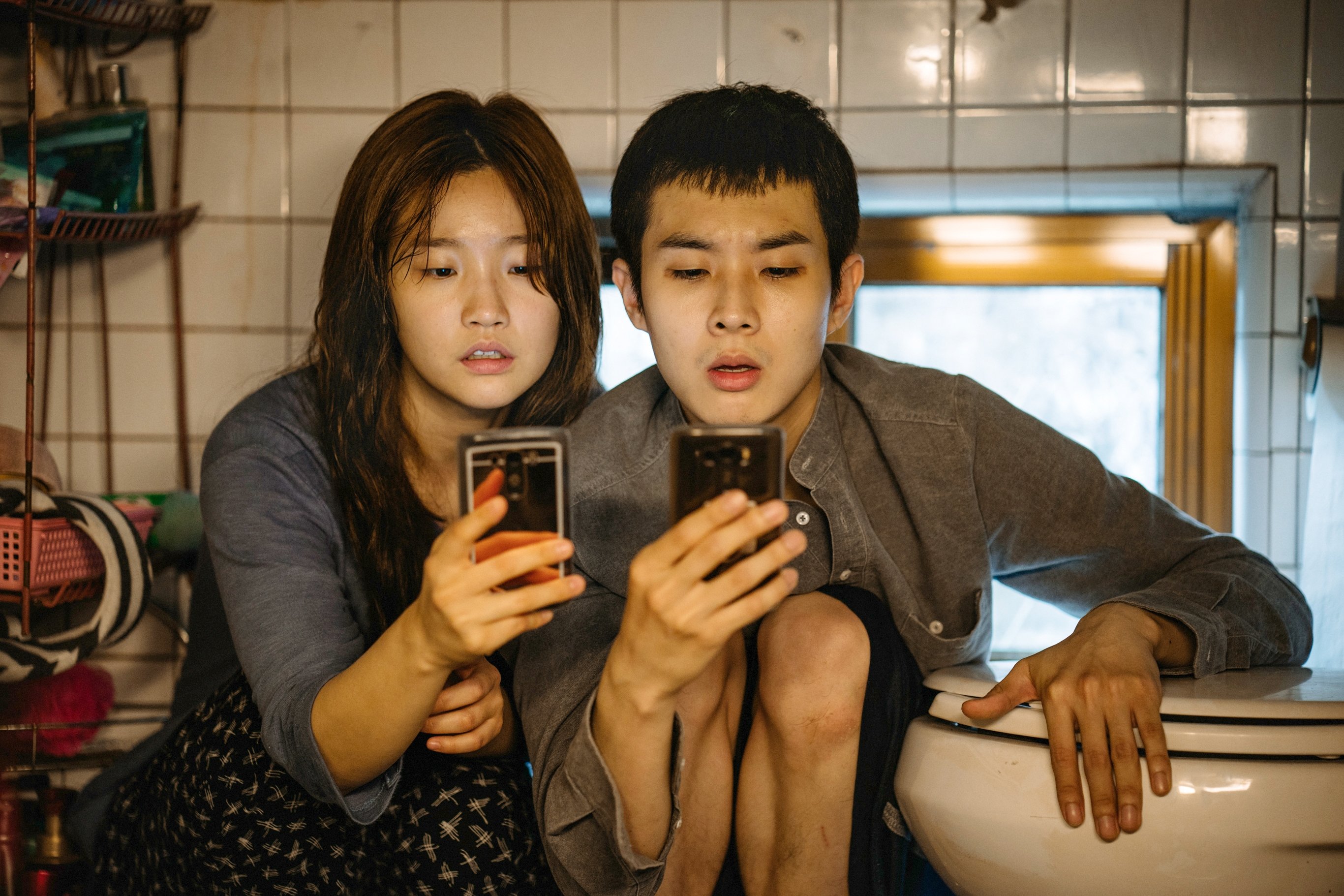 South Korean actors Park So Dam and Choi Woo in a scene from "Parasite". (DPA)