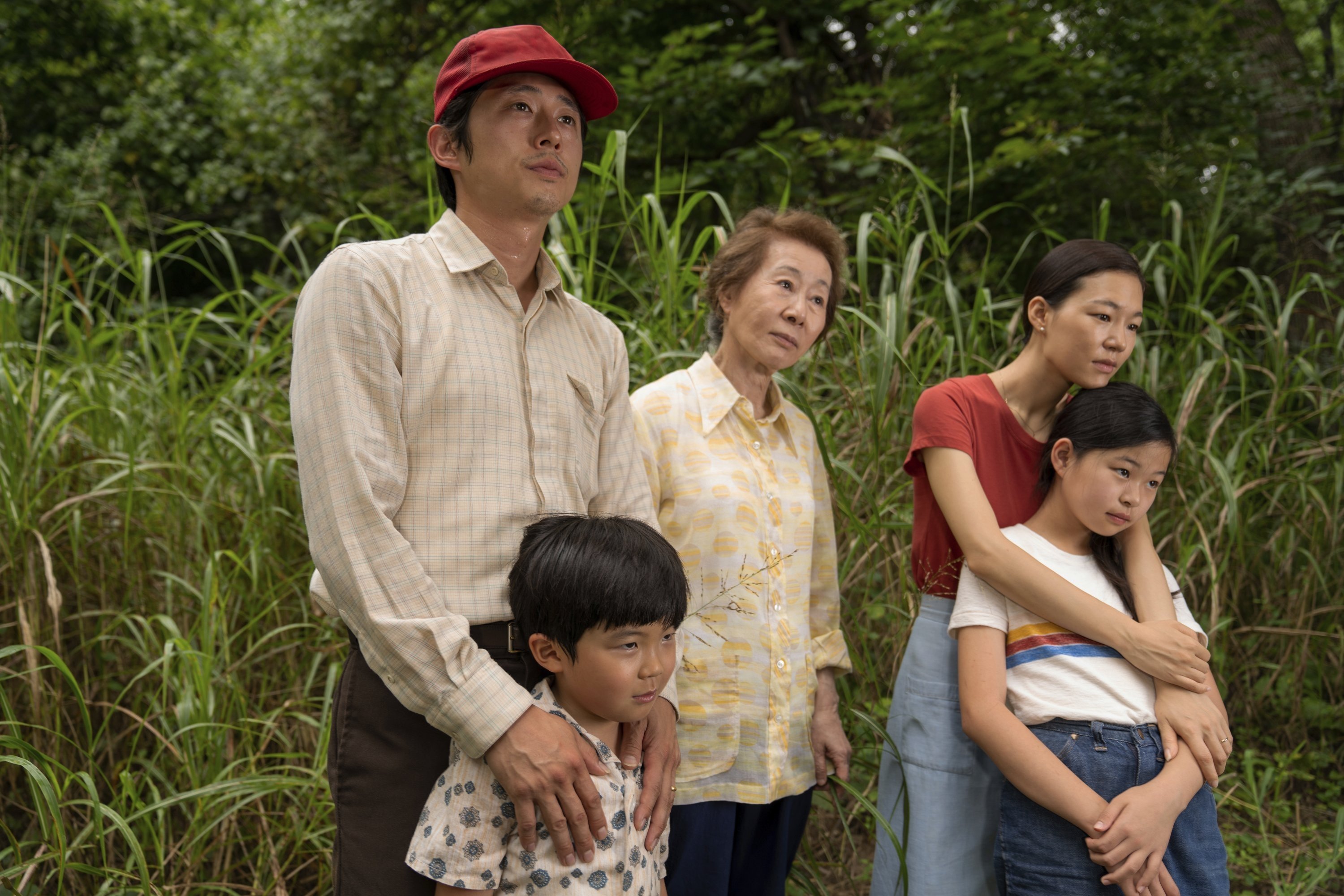 A still image from the film “Minari” shows from left, Steven Yeun, Alan S. Kim, Yuh-Jung Youn, Yeri Han, and Noel Cho. (AP)