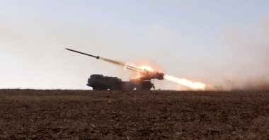 A Russian self-propelled multiple rocket launcher system launches a rocket during military exercises at the Opuk training area in Crimea, in this still image taken from a handout video released Feb. 15, 2022. (Russian Defense Ministry via Reuters)