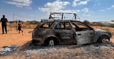 The wreckage of a burned car is seen following an overnight attack in Mogadishu, Somalia, Feb. 16, 2022. (Reuters Photo)