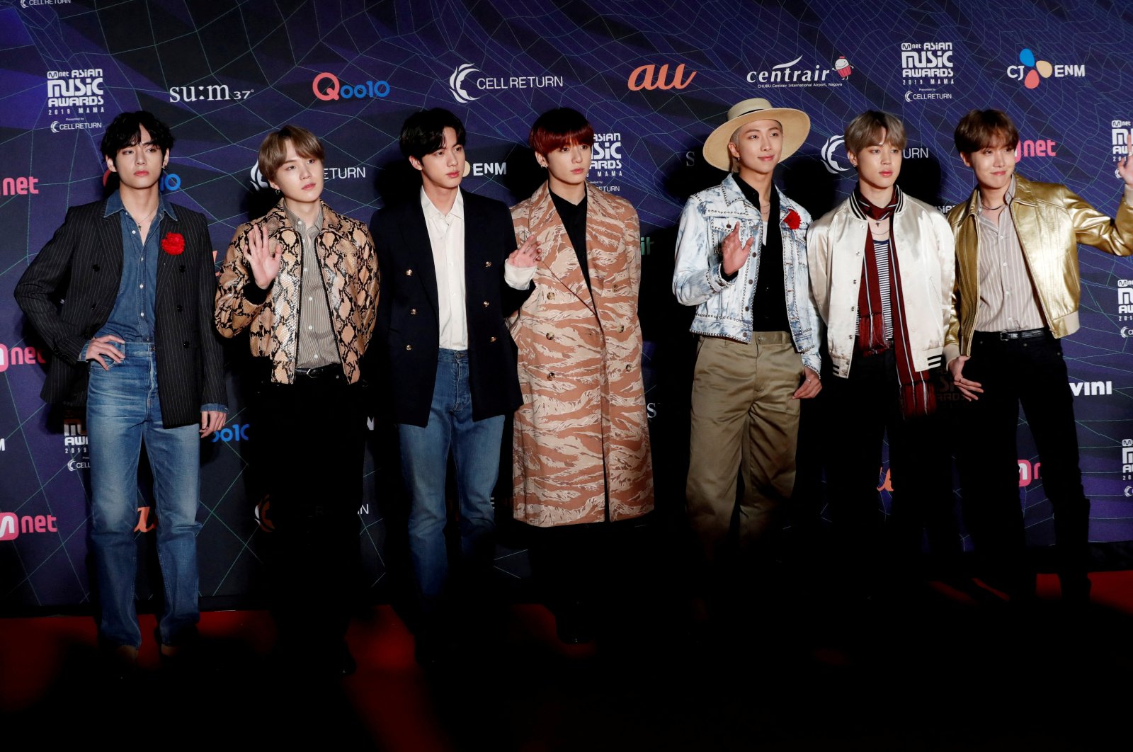 Members of South Korean boy band BTS pose on the red carpet during the annual MAMA Awards at Nagoya Dome in Nagoya, Japan, December 4, 2019. (REUTERS)