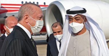 President Recep Tayyip Erdoğan (L) being welcomed by Crown Prince of Abu Dhabi Sheikh Mohammed bin Zayed Al Nahyan (MBZ) at Abu Dhabi International Airport, Abu Dhabi, UAE, Feb. 14, 2022. (Turkish Presidential Press Service via AFP)