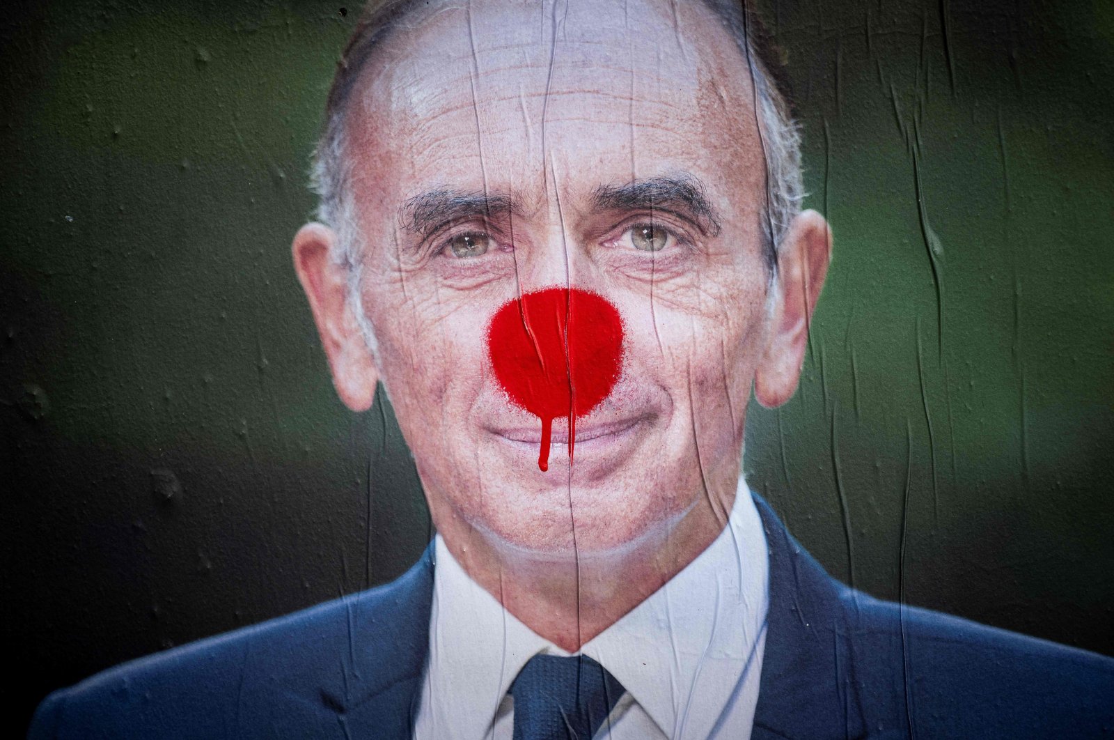 A photograph shows a campaign poster of French far-right party &quot;Reconquete!&quot; leader, media pundit and candidate for the 2022 French presidential election Eric Zemmour in Toulouse, southern France, Feb. 15, 2022. (AFP Photo)