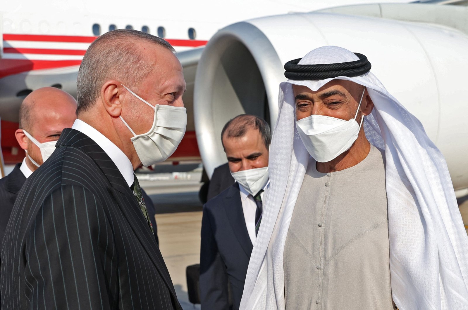 President Recep Tayyip Erdoğan (L) being welcomed by Crown Prince of Abu Dhabi Sheikh Mohammed bin Zayed Al Nahyan (MBZ) at Abu Dhabi International Airport, Abu Dhabi, UAE, Feb. 14, 2022. (Turkish Presidential Press Service via AFP)