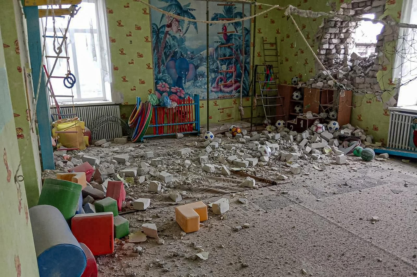 A view of a kindergarten building after alleged shelling by separatist forces in Stanytsia Luhanska, eastern Ukraine, Feb. 17, 2022. (Ukrainian Joint Forces Operation via AP Photo)
