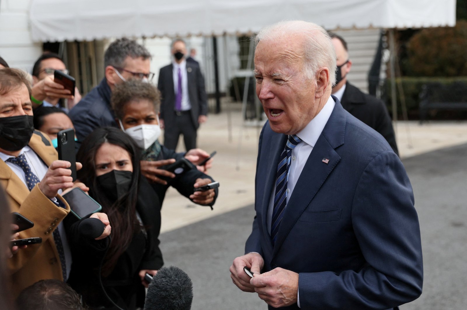 U.S. President Joe Biden speaks to the news media about the situation in Ukraine before boarding Marine One for travel to Ohio from the South Lawn of the White House in Washington, U.S., Feb. 17, 2022. (Reuters Photo)
