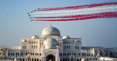 The United Arab Emirates (UAE) Air Force aerobatic display team makes a stunt flying in colors of the Turkish flag, red and white, for President Recep Tayyip Erdoğan's visit to the country, in the capital Abu Dhabi, UAE, Feb. 14, 2022. (AA Photo)