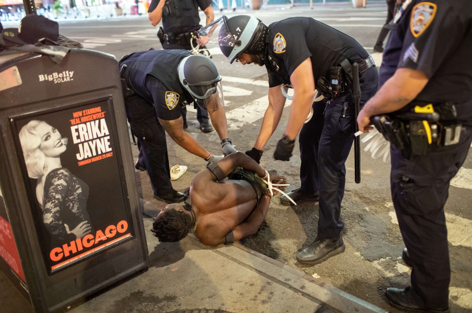 New York City police officers detain a man during a night of protests and vandalism over the death of George Floyd in New York City, U.S., on June 1, 2020. (AFP Photo)