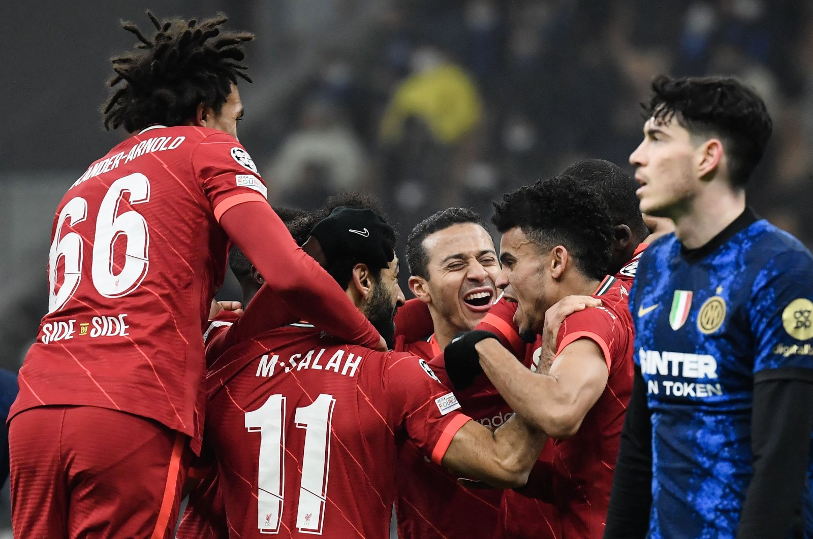 Liverpool players celebrate a goal against Inter Milan in a Champions League game, Milan, Italy, Feb. 16, 2022. (AFP Photo)