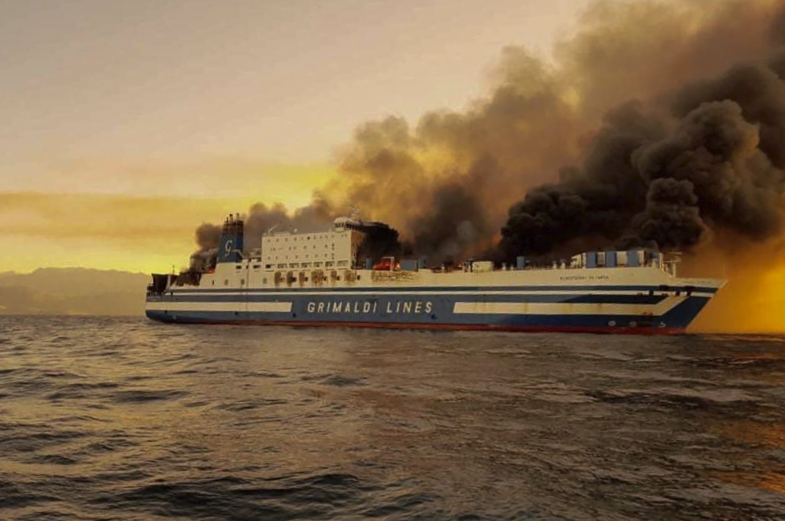 View of ferry on fire, near the island of Corfu, Greece, Feb. 18, 2022. (DEBATER.GR VIA AP) 
