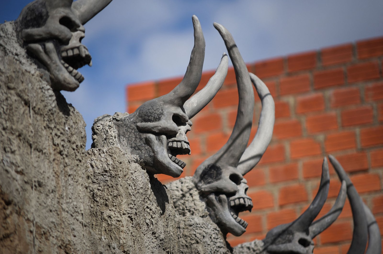 Sculptures of horned devils adorn the house of Bolivian miner David Choque, in El Alto, Bolivia, Feb. 16, 2022. (Reuters Photo)