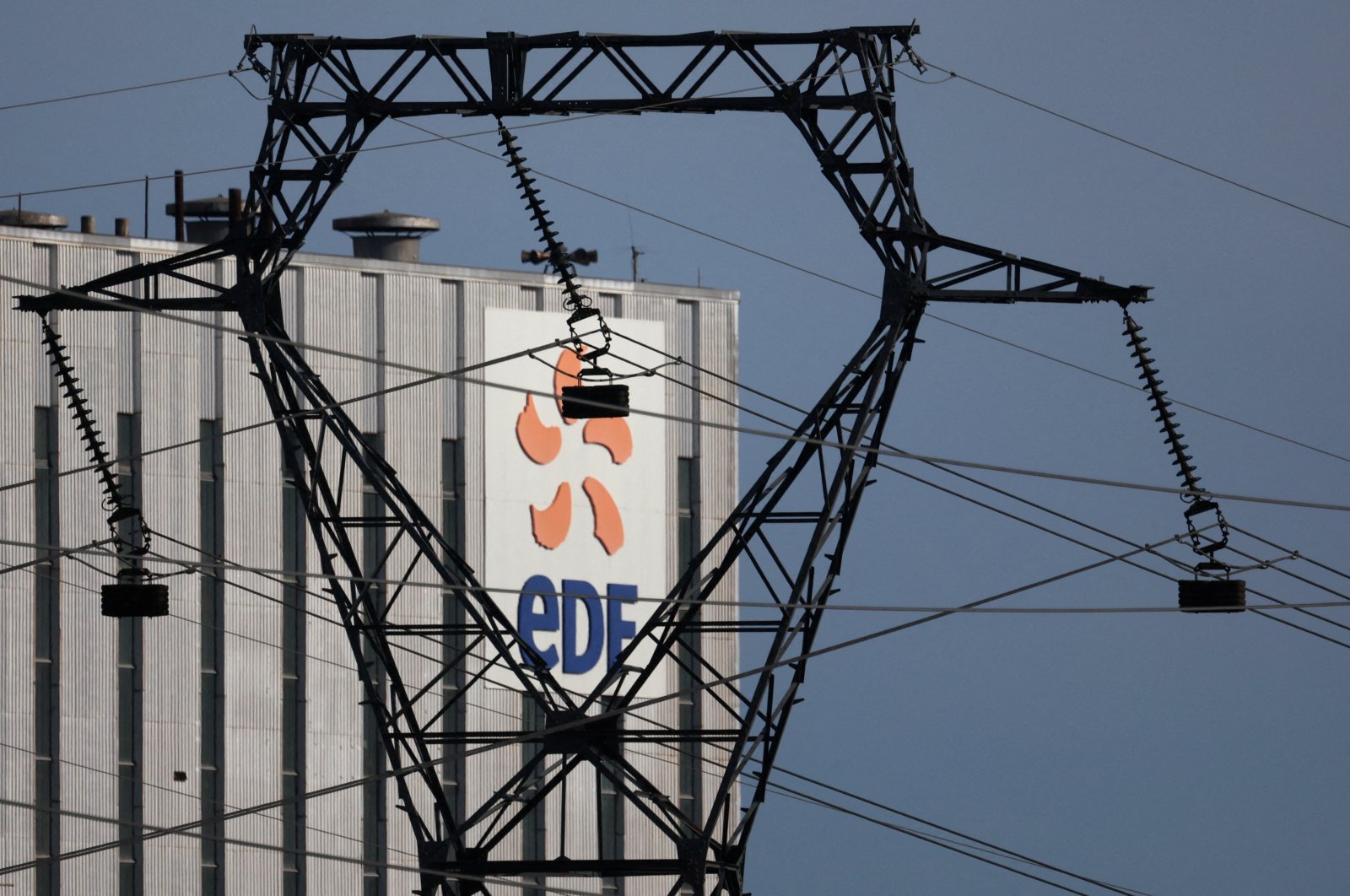 Electrical power pylons of high-tension electricity power lines are seen next to the EDF power plant in Bouchain, near Valenciennes, France, Feb.15, 2022. (Reuters Photo)