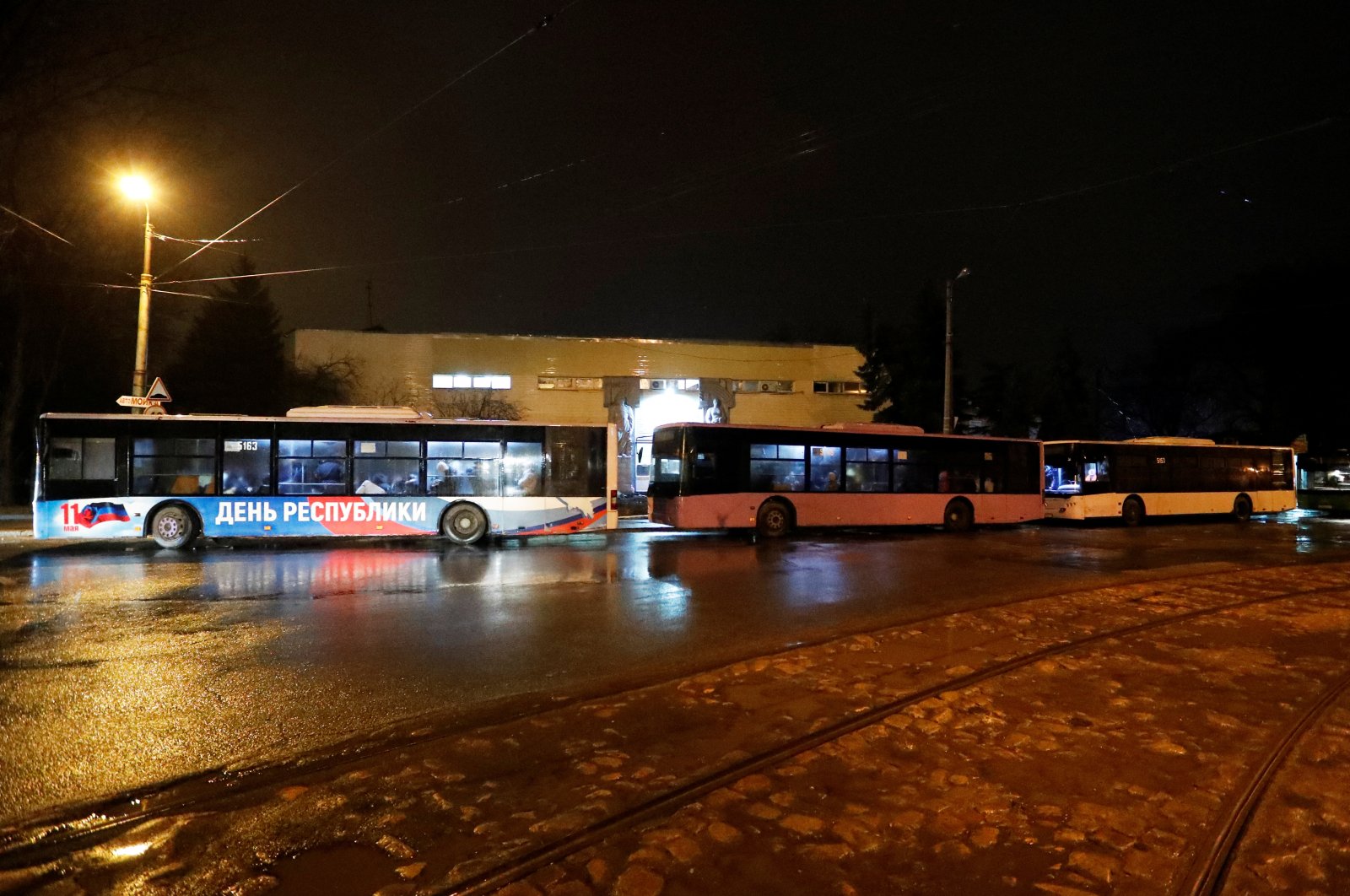 Buses arranged to evacuate local residents are seen in the separatist-controlled city of Donetsk, Ukraine Feb. 18, 2022. (Reuters File Photo)
