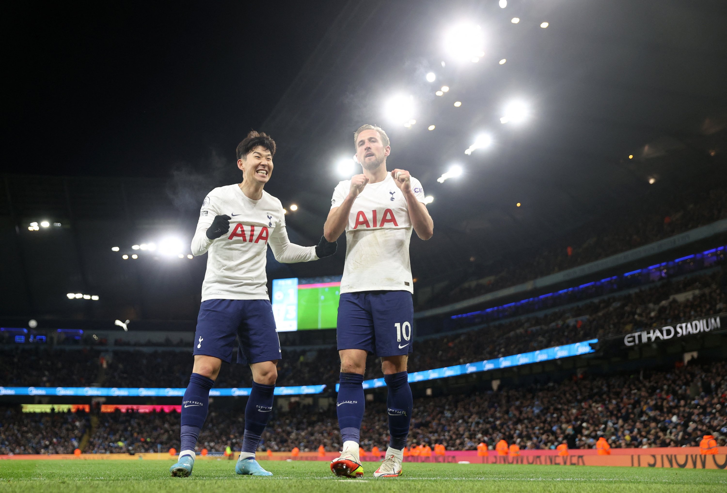 Tottenham Hotspur's Harry Kane (R) celebrates scoring their third goal with teammate Son Heung-min before it is ruled out following a VAR review during the English Premier League match at Etihad Stadium, Manchester, U.K., Feb. 19, 2022. (Action Images via Reuters/Carl Recine)(Action Images via Reuters/Carl Recine)