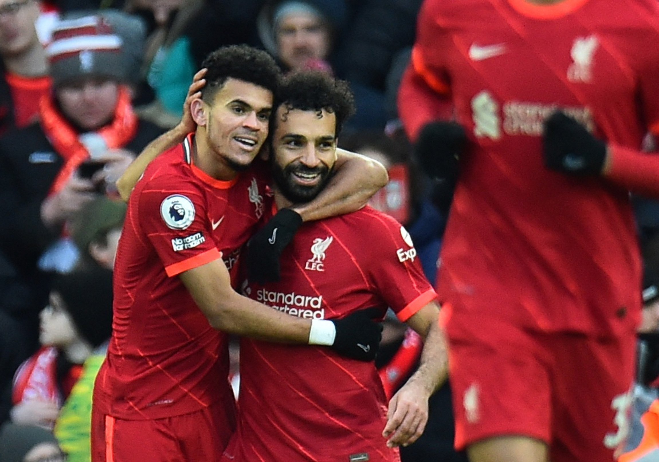 Liverpool's Luis Diaz celebrates scoring their third goal with Mohamed Salah (R) during the English Premier League match at Anfield Stadium, Liverpool, U.K., Feb. 19, 2022.(Reuters Photo)