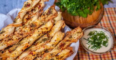 Puff pastry sticks with cheese and spices. (Shutterstock) 